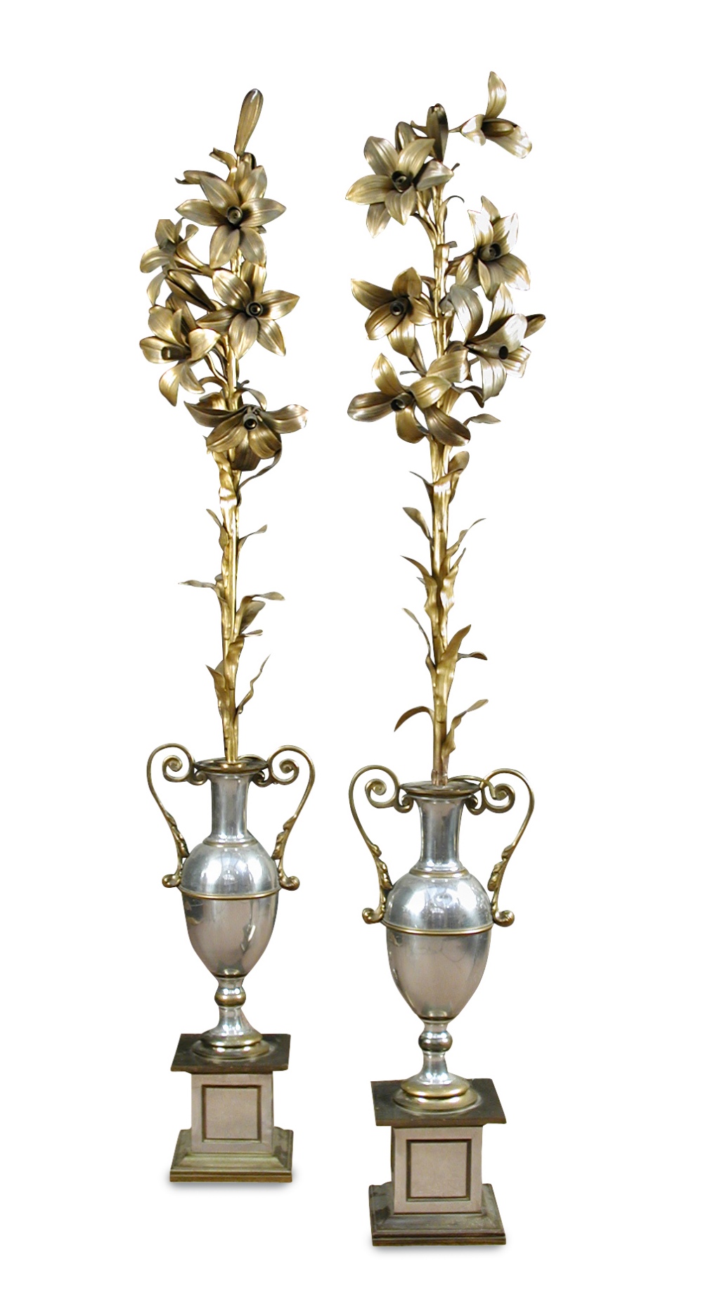 Possibly Maison Charles, a pair of silvered and gilt metal floor lamps, the gilt foliate stems to