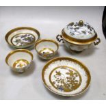 A 'Dot' period Meissen covered bowl ensuite with a pair of tea bowls and saucers, the blue and white