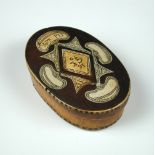 A horn inlaid wood oval snuff box dated 1650, the central diamond to the oval lid inscribed '1650 CK