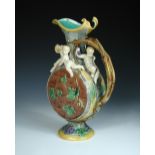 A Minton majolica 'Protat' ewer, date code for 1862, the designer Hugues Protat's monogram below the