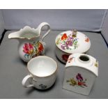 A collection of Meissen tea wares. with floral decoration, the tea caddy with lid missing, 10cm (4