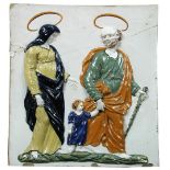 An 18th century maiolica relief plaque of the Holy Family, possibly Italian, St Joseph leads the