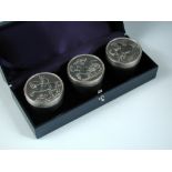 A set of three silver commemorative boxes, by Christopher Nigel Lawrence, London 2000, each box with