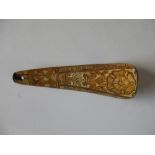 Art Mindum Anno Domini 1600', a horn shoehorn so inscribed on one side of an incised Tudor rose