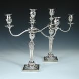 A pair of Edwardian silver candelabra, by Thomas Bradbury & Sons Ltd, London 1906/1908, each with