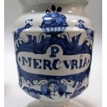 A pair and another mid 18th century Delft blue and white drug jar, the pair raised on flared