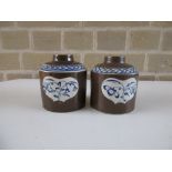 Two late 18th century Leeds type creamware brown ground tea caddies, each with blue diamond diaper