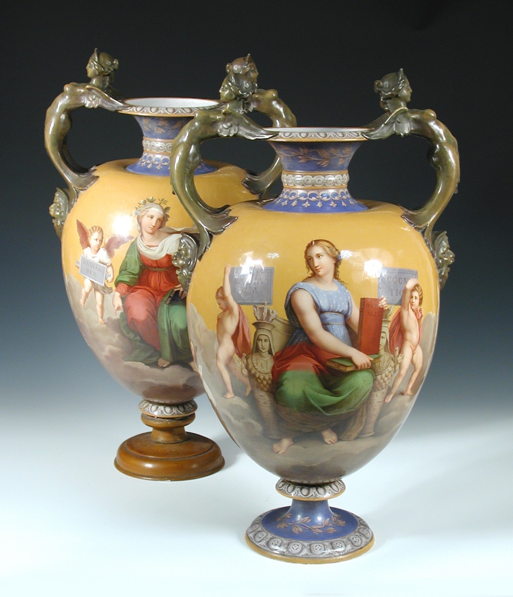 Attributed to Minton, a pair of mid Victorian majolica vases, each with sea green caryatid handles