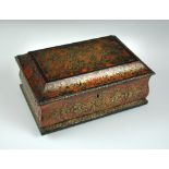 A 19th century French Boulle work box, of bombé rectangular form, the hinged cover opening to reveal