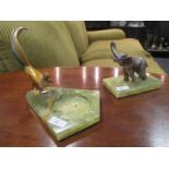 An Art Deco style bronze figure of an elephant, on an onyx base, together with a similar figure of a