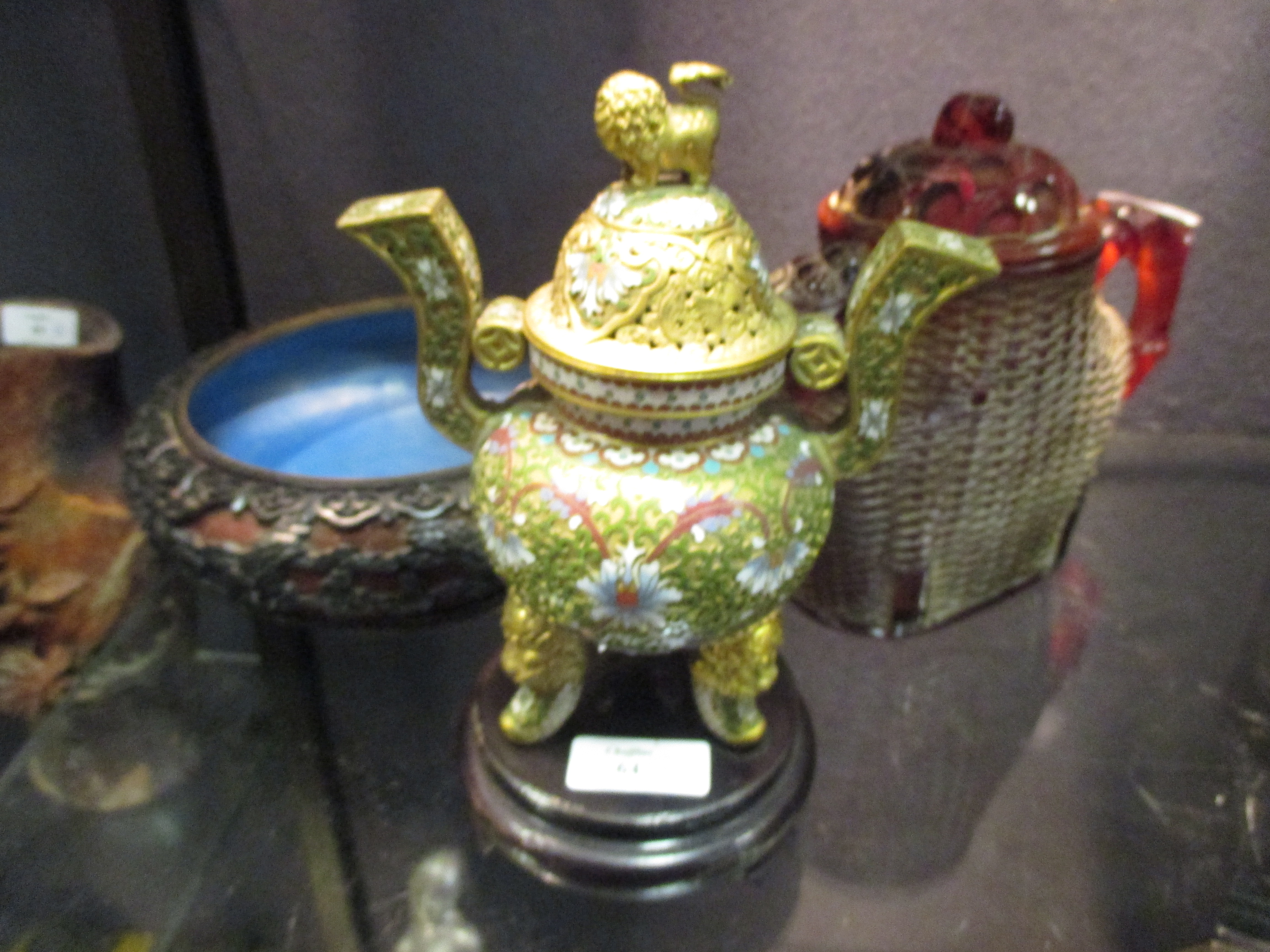 A Chinese two tone lacquer bun shaped bowl, an 'amber' tea pot and a cloisonne censer and cover (3)