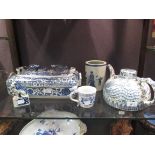 A Ming marked blue and white tea pot, a lion seal, a cup, a brush pot and a Ming style supper dish