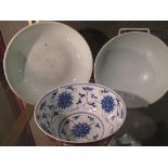 Two Kangxi style blue and white bowls the smaller for the Batavian market together with another