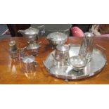 A Dixon's pewter five piece Art Deco style tea set by Dixons, together with another set attributed