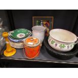 Clarice Cliff seven dinner and two small plates, a Clarice Cliff bead picture, a Wedgwood black
