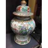 A Chinese famille verte baluster jar and cover, Kangxi marks Overall with rubbing, usual ware and