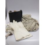 A collection of ladies evening gloves, bags and lace
