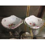 A pair of Meissen two handled dishes with floral encrusted and painted decoration and scrolled