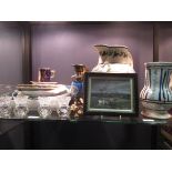 A Chinese blue and white dish, two pairs of floral painted ceramic and metal candlesticks and