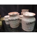 EG. Seven labelled white pottery kitchen storage jars (7)