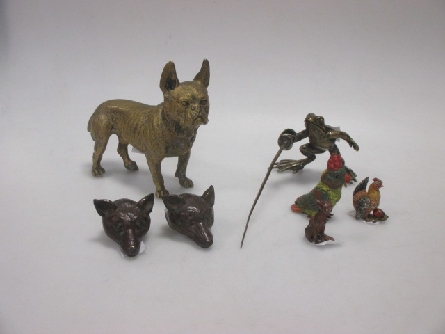 A collection of Wiener bronzes; dog, frog, fencer, two fox heads, two cold painted birds and a cat