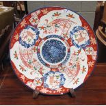 An early 20th century Japanese Imari dish 47cm diameter
