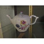 A Meissen teapot with moulded lattice border the globular body painted with flowers with an