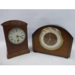 An oak cased mantle clock with a Smiths movement and one other mantle clock stamped W.H.R.