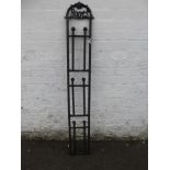 A folding three tiered wall hanging boot rack.