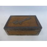 A mahogany and silver banded cigarette box, maker Hilliard & Thomason, Birmingham, 1882.