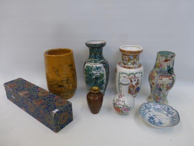 An assortment of Oriental ceramic vases, a cloisonne vase and a rolled screen print.