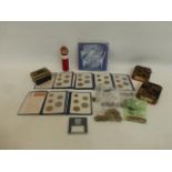 An assortment of English coinage including six sets of Britain's First Decimal Coins and a tube of