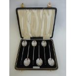 A cased set of six silver coffee bean spoons, maker A.P. & Co., Birmingham 1936.