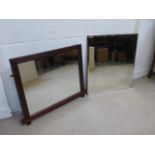 A square shaped bevel edged wall mirror and a mahogany framed oval mantle mirror.