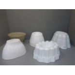 Five assorted ceramic jelly moulds including Shelley.