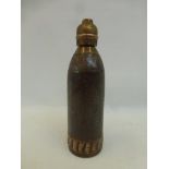 A military time and percussion fuse shell case complete with nose timer, stamped 1-12-1900 to the
