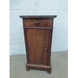 A mid 19th Century Continental well figured mahogany and marble topped pot cupboard with single