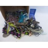 A box of assorted costume jewellery.