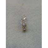 A 9ct white gold twenty-one stone diamond cluster ring, size L.