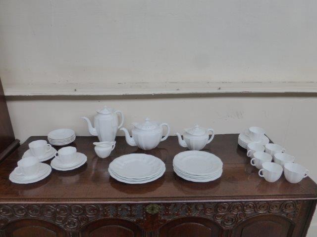 A Royal Crown Derby white six setting tea/coffee sandwich set.