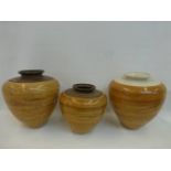Three contemporary bamboo effect vases.