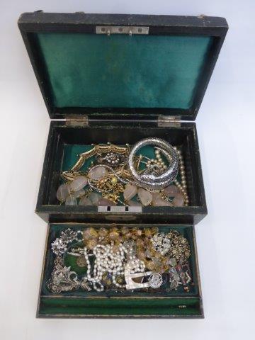 A box of assorted costume jewellery including a Venetian beaded necklace.