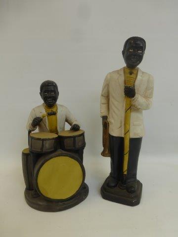 A pair of pottery jazz players.