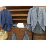 A selection of gentleman's morning wear including a navy morning coat with matching waistcoat and