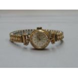 A 9ct gold Burein lady's wristwatch.