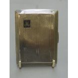 An Art Deco silver cigarette case with engine turned decoration, maker - Smith and Bartlem,