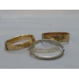 Two silver bangles, one inscribed Fight The Ban, and two 9ct gold plated with metal core bangles.