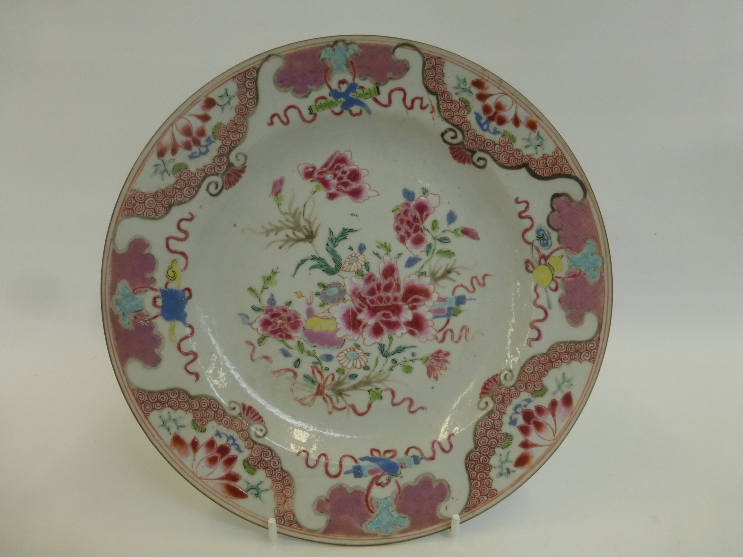 An 18th Century Emperor Qianlong famille-rose plate circa 1740-1760.