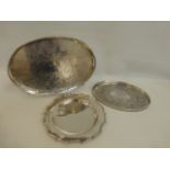 A pie crust shaped salver inscribed Wonguire Trophy for Best Dog, an oval shaped galleried tray