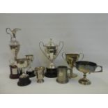 A group of eight silver plated trophies all from the Bath, Bristol and West of England Pekingese